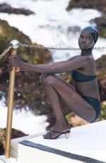 ADUT AKECH in Bikini at a Photoshoot at Bondi Icebergs Pool 12/13/2020