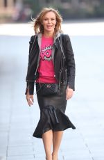 AMANDA HOLDEN in Leather Jacket and Skirt Out in London 03/27/2020