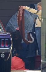 AMBER HEARD and BIANCA BUTTI Clean Out Their Garage in Los Angeles 03/27/2020