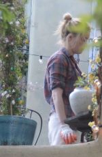 AMBER HEARD and BIANCA BUTTI Out Gardening at Her Home in Los Angeles 03/28/2020