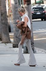 ANNALYNNE MCCORD Arrives at Her Home in Los Angeles 03/01/2020