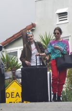 ASHLEY BENSON and CARA DELEVINGNE Out with Their Luggage in Los Angeles 03/16/2020