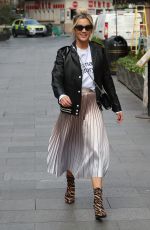 ASHLEY ROBERTS in Shimmering Skirt, Biker Jacket and Animal Printed Boots Out in London 03/17/2020