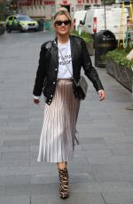 ASHLEY ROBERTS in Shimmering Skirt, Biker Jacket and Animal Printed Boots Out in London 03/17/2020