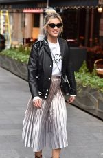 ASHLEY ROBERTS in Shimmering Skirt, Biker Jacket and Animal Printed Boots Out in London 03/17/2020