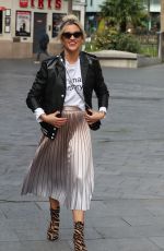 ASHLEY ROBERTS in Shimmering Skirt, Biker Jacket and Animal Printed Boots Out in London 03/17/2020