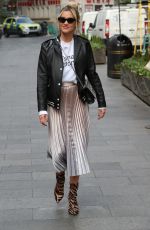 ASHLEY ROBERTS in Shimmering Skirt, Biker Jacket and Animal Printed Boots Out in London 03/17/2020