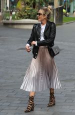 ASHLEY ROBERTS in Shimmering Skirt, Biker Jacket and Animal Printed Boots Out in London 03/17/2020