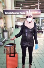 BLANCA BLANCO Wears Mask and Gloves while Flying to Detroit 03/13/2020