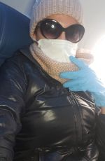 BLANCA BLANCO Wears Mask and Gloves while Flying to Detroit 03/13/2020