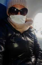 BLANCA BLANCO Wears Mask and Gloves while Flying to Detroit 03/13/2020