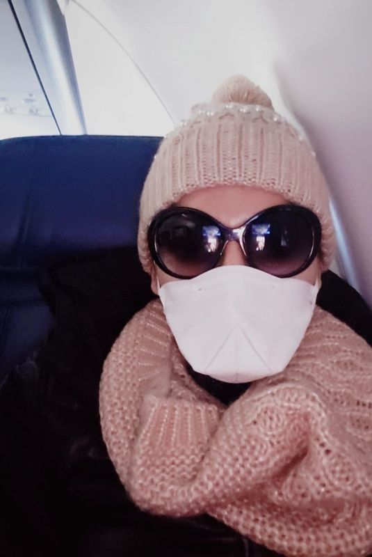 BLANCA BLANCO Wears Mask and Gloves while Flying to Detroit 03/13/2020