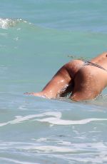 CANDICE SWANEPOEL in Bikini on the Beach in Miami 03/17/2020