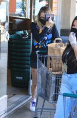 CARA DELEVINGNE and ASHLEY BENSON with Their Dog Out Shopping in Los Angeles 03/26/2020