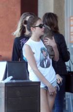 CARA DELEVINGNE and ASHLEY BENSON with Their Dog Out Shopping in Los Angeles 03/26/2020