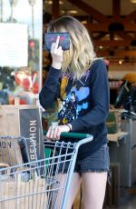 CARA DELEVINGNE and ASHLEY BENSON with Their Dog Out Shopping in Los Angeles 03/26/2020