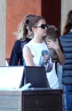 CARA DELEVINGNE and ASHLEY BENSON with Their Dog Out Shopping in Los Angeles 03/26/2020