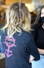 CARA DELEVINGNE and ASHLEY BENSON with Their Dog Out Shopping in Los Angeles 03/26/2020