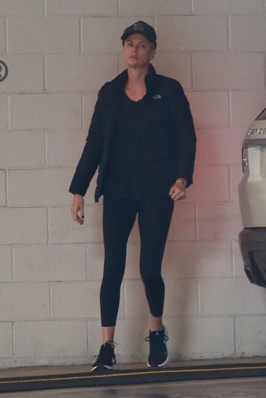 CHARLIZE THERON Out and About in Beverly Hills 03/18/2020