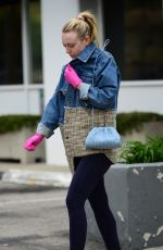 DAKOTA FANNING in Slippers and Surgical Gloves Out in Los Angeles 03/16/2020