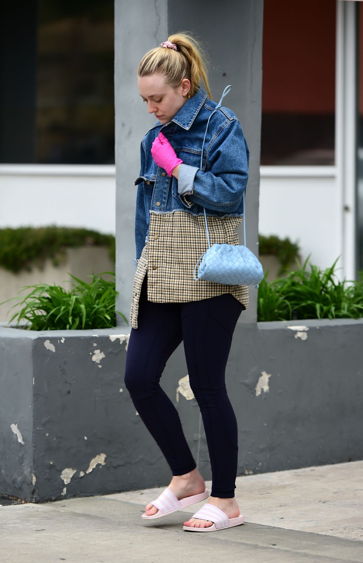DAKOTA FANNING in Slippers and Surgical Gloves Out in Los Angeles 03/16 ...