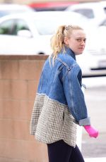 DAKOTA FANNING in Slippers and Surgical Gloves Out in Los Angeles 03/16/2020