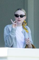 DAKOTA FANNING Outside Her House in Los Angeles 03/21/2020