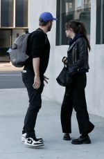 DAKOTA JOHNSON and Chris Martin at Crossroads in Los Angeles 03/11/2020