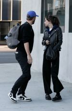 DAKOTA JOHNSON and Chris Martin at Crossroads in Los Angeles 03/11/2020