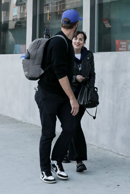 DAKOTA JOHNSON and Chris Martin at Crossroads in Los Angeles 03/11/2020