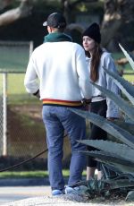 DAKOTA JOHNSON and Chris Martin Out in Malibu 03/28/2020
