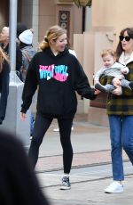 DAKOTA JOHNSON Out in Disneyland in Anaheim 03/01/2020