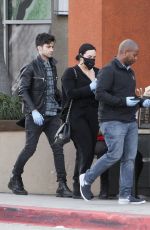 DEMI LOVATO with Black Face Mask and Disposable Gloves Shopping at Erewhon in Los Angeles 03/15/2020