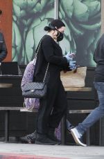 DEMI LOVATO with Black Face Mask and Disposable Gloves Shopping at Erewhon in Los Angeles 03/15/2020