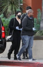 DEMI LOVATO with Black Face Mask and Disposable Gloves Shopping at Erewhon in Los Angeles 03/15/2020