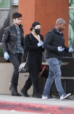 DEMI LOVATO with Black Face Mask and Disposable Gloves Shopping at Erewhon in Los Angeles 03/15/2020