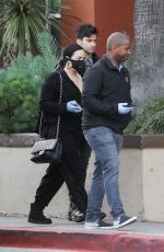 DEMI LOVATO with Black Face Mask and Disposable Gloves Shopping at Erewhon in Los Angeles 03/15/2020