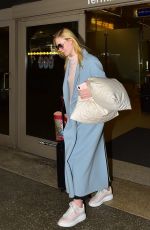 ELLE FANNING at LAX Airport in Los Angeles 02/29/2020