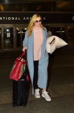ELLE FANNING at LAX Airport in Los Angeles 02/29/2020