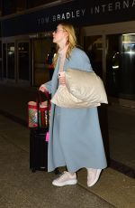 ELLE FANNING at LAX Airport in Los Angeles 02/29/2020