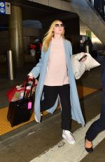 ELLE FANNING at LAX Airport in Los Angeles 02/29/2020