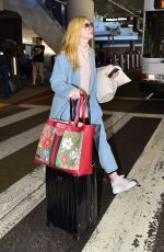ELLE FANNING at LAX Airport in Los Angeles 02/29/2020