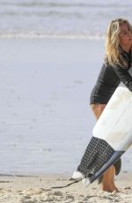 ELSA PATAKY in Wetsuit on the Beach in Byron Bay 03/14/2020