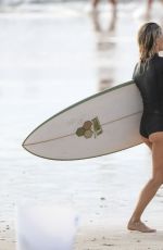 ELSA PATAKY in Wetsuit on the Beach in Byron Bay 03/14/2020