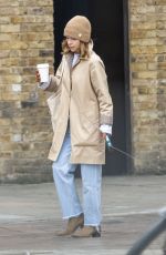 EMILIA CLARKE Out with Her Dog in London 03/20/2020