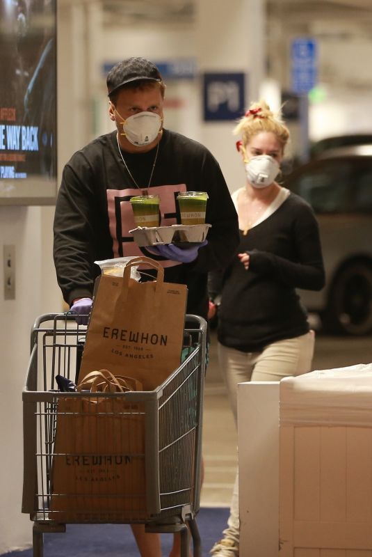 HEIDI MONTAG and Spencer Pratt with Face Masks and Latex Gloves Shopping at Erewhon Market in Pacifiy Palisades 03/24/2020