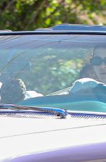 KENDALL JENNER in Her Purple 1960 Cadillac Eldorado Convertible Driving Out in Los Angeles 03/18/2020