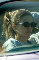 KENDALL JENNER in Her Purple 1960 Cadillac Eldorado Convertible Driving Out in Los Angeles 03/18/2020