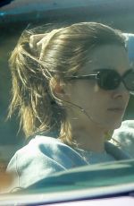 KENDALL JENNER in Her Purple 1960 Cadillac Eldorado Convertible Driving Out in Los Angeles 03/18/2020
