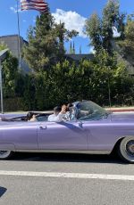 KENDALL JENNER in Her Purple 1960 Cadillac Eldorado Convertible Driving Out in Los Angeles 03/18/2020